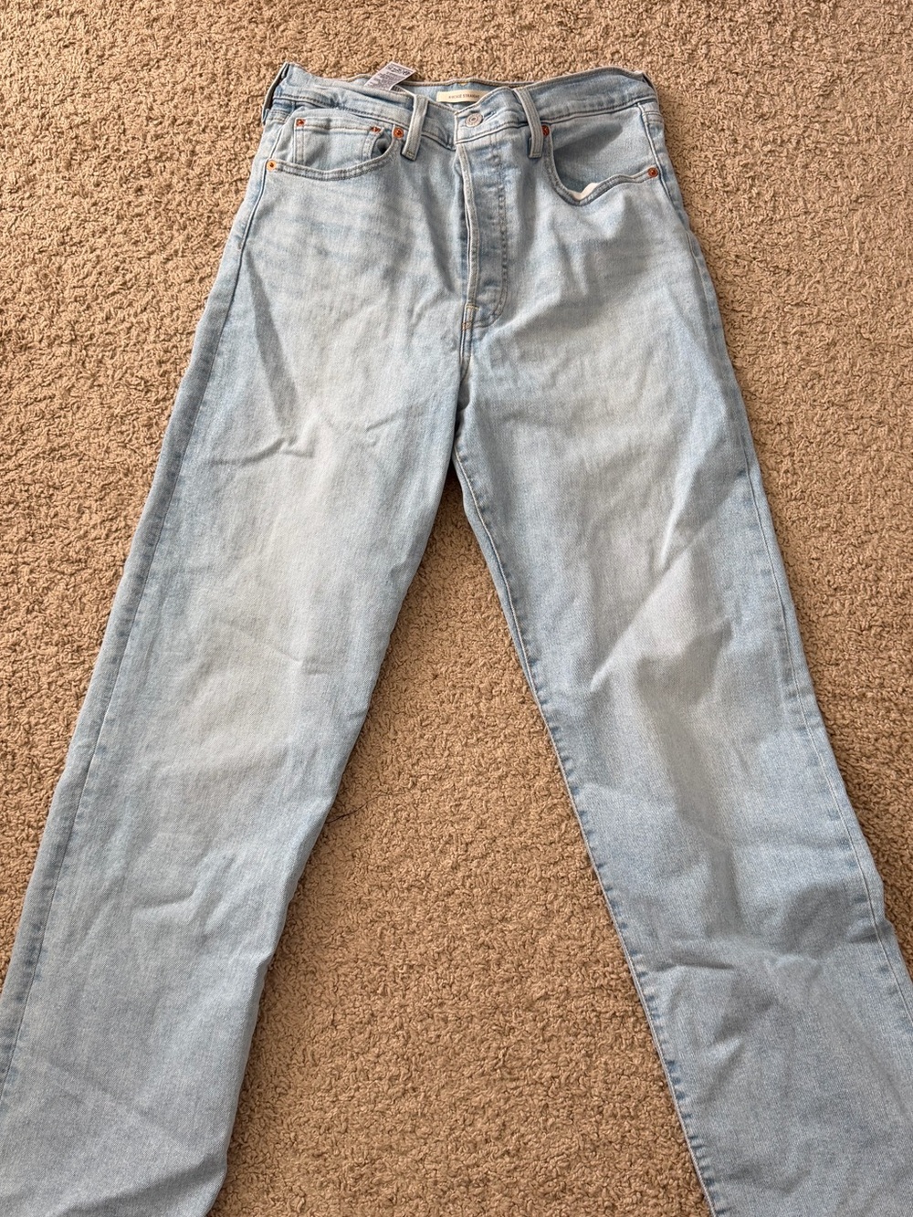 Levi’s light blue Ribcage straight. Women